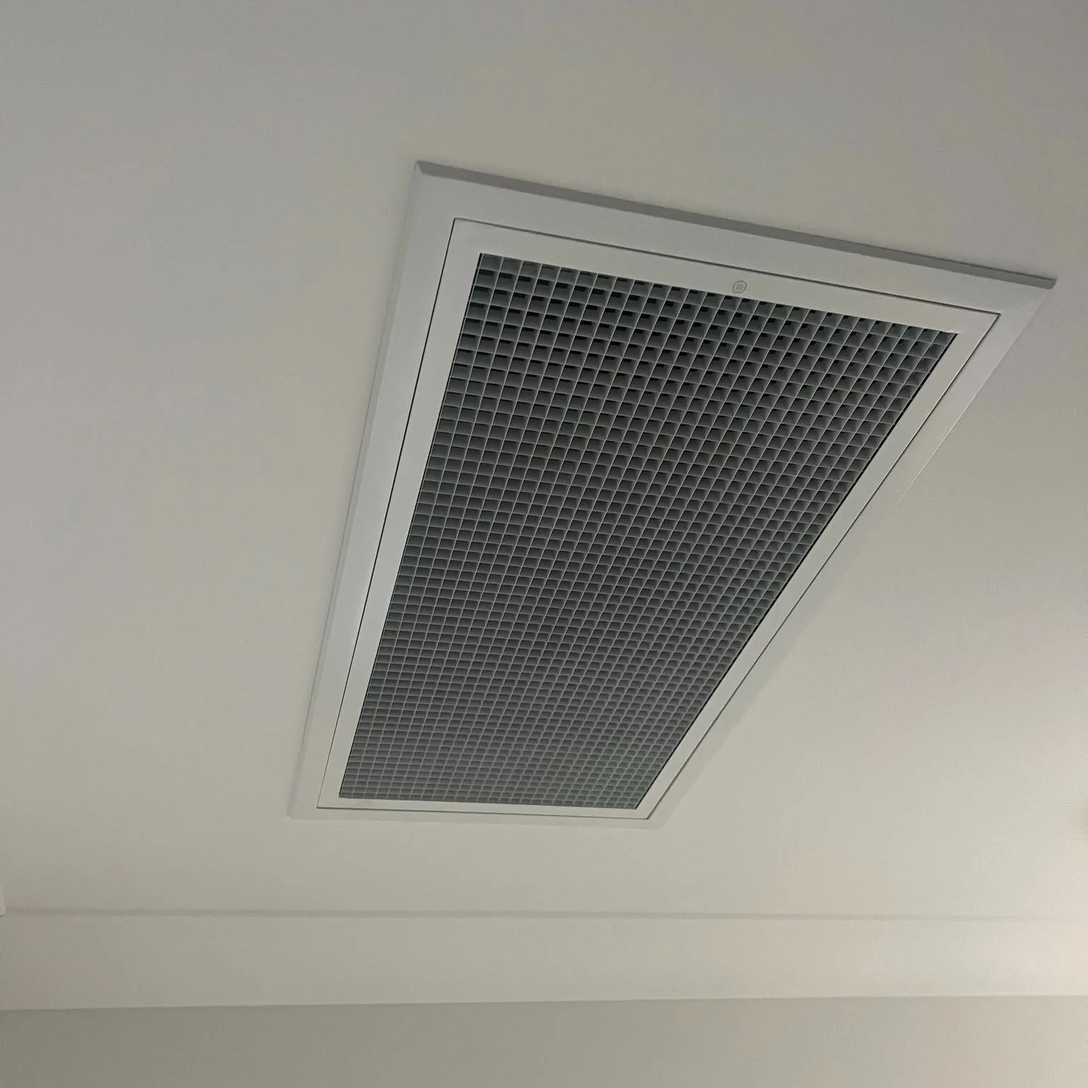 FHC install: split system indoor unit above a doorway, Coffs Harbour