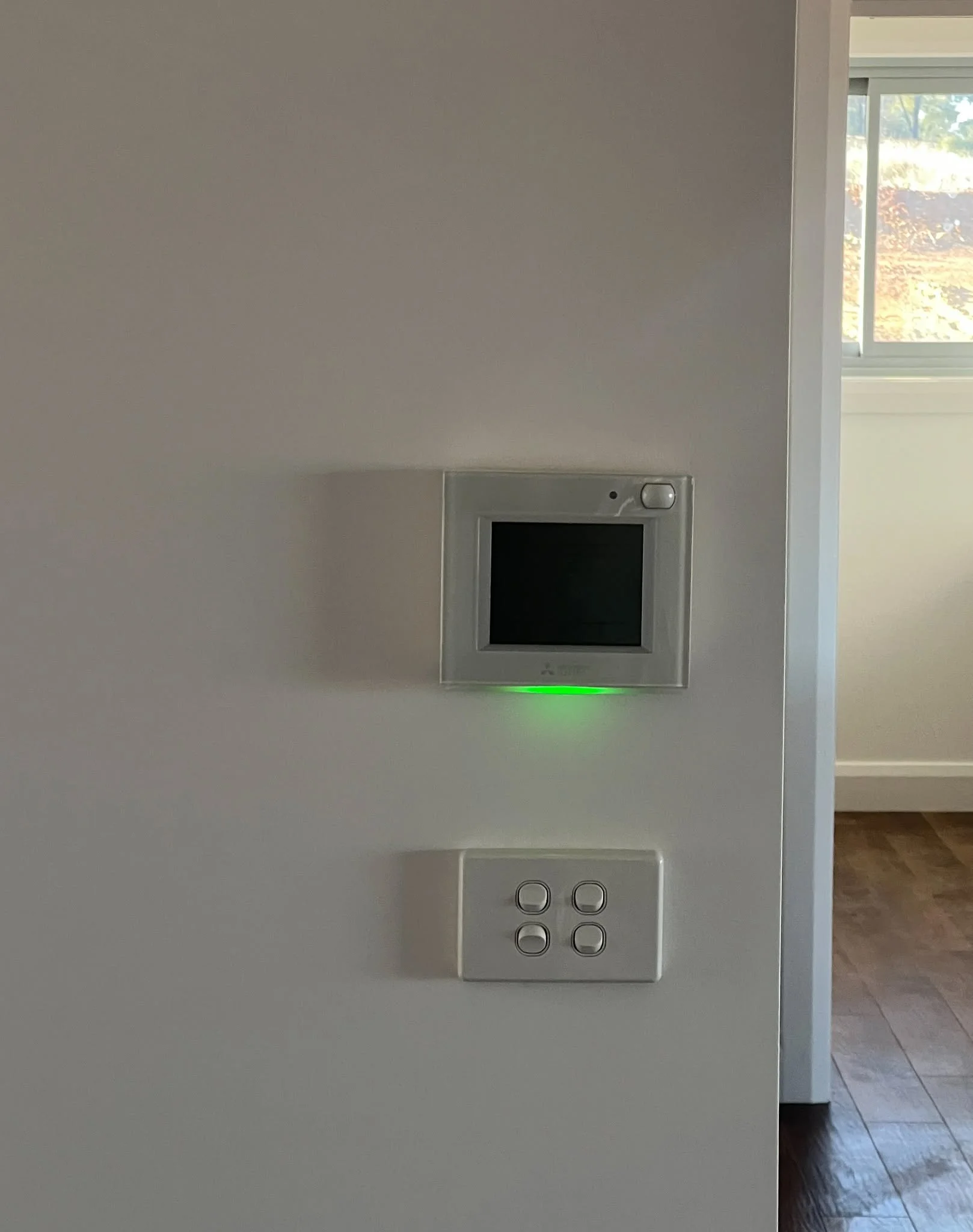 FHC install: portrait view of split system indoor unit on a feature wall, Coffs Harbour