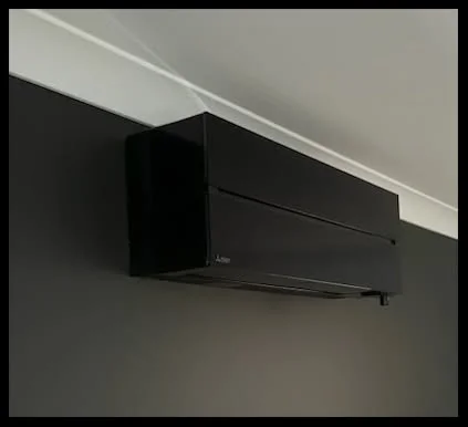 FHC install: split system indoor unit close-up above lounge, Coffs Harbour
